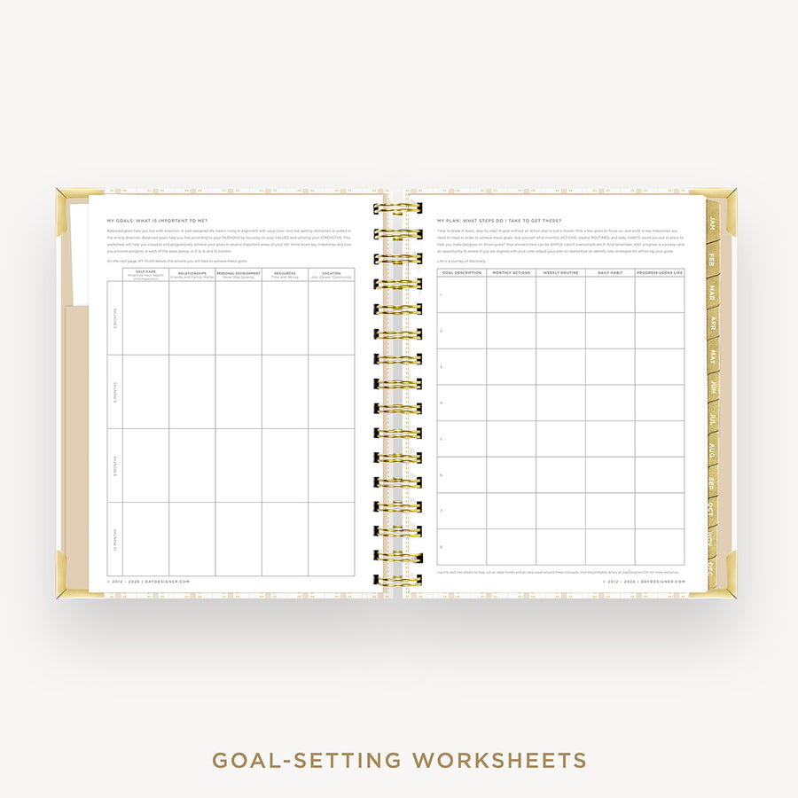 An open spiral-bound planner or notebook showing two printed goal-setting worksheet pages, with a gold-toned ring binder and gold border accents on a light gray background. Text below reads 'GOAL-SETTING WORKSHEETS'.