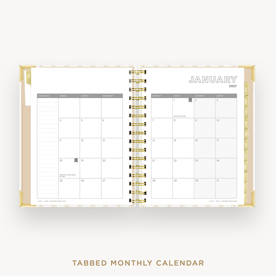 An open monthly calendar planner with gold spiral binding, showing January 2027 on the right page and tabbed monthly pages on the left. The product is photographed on a clean white background with the text 'TABBED MONTHLY CALENDAR' below.