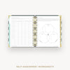 Open spiral-bound book displaying self-assessment worksheets with a Venn diagram on a white background.