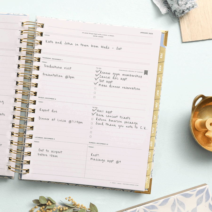 Day Designer 2024 weekly planner: Casa Bella opened with writing on it