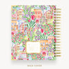 Colorful planner with floral and building design on a white background