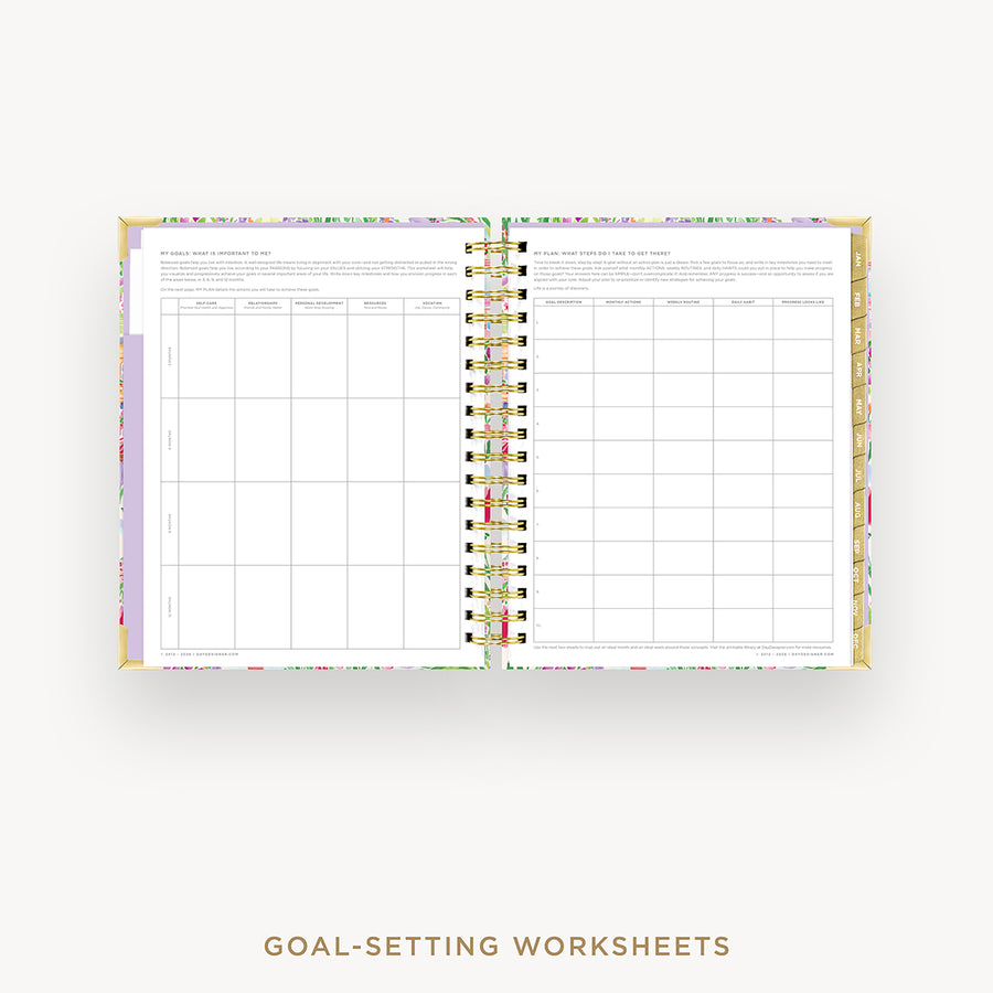 Goal-setting worksheets in a planner with colorful border on a white background