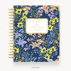 Floral notebook cover with 'Day Designer' branding on a white background