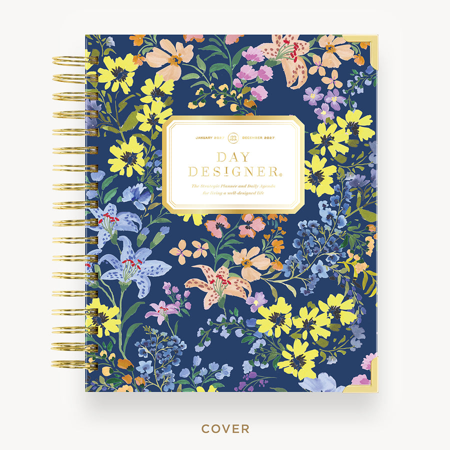 Floral notebook cover with 'Day Designer' branding on a white background