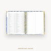 Open planner showing a page with a list of important dates on a white background