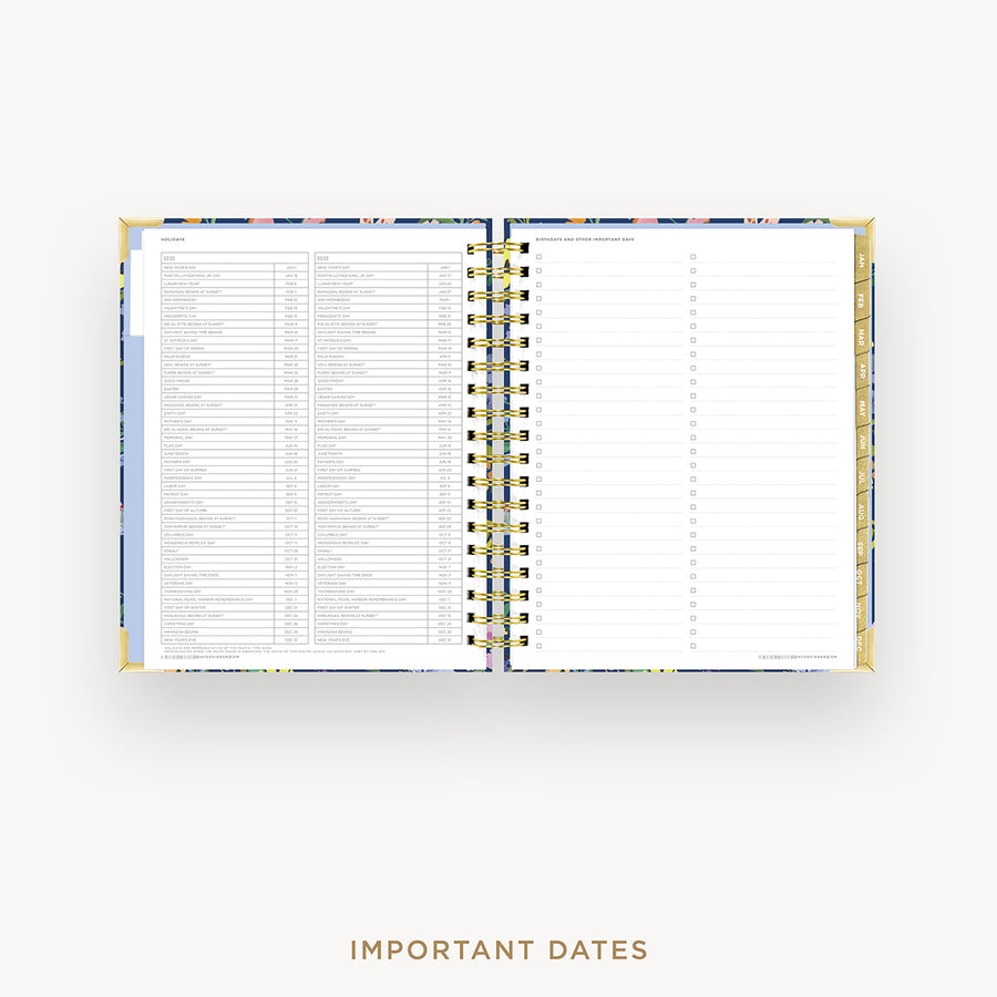 Open planner showing a page with a list of important dates on a white background
