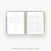 Open book with 'Introduction & Instructions' text on a white background