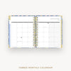 Tabbed monthly calendar open to January on a white background