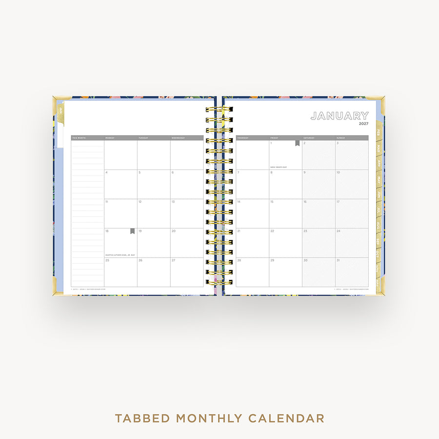 Tabbed monthly calendar open to January on a white background