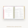 Open book showing pages with text on a white background