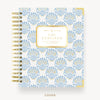 Patterned notebook with 'Day Designer' branding on a white background