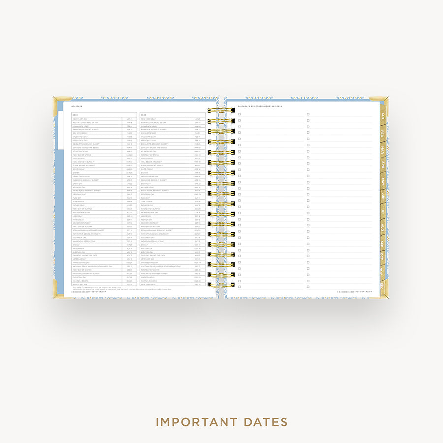 Open planner showing a page with important dates on a white background