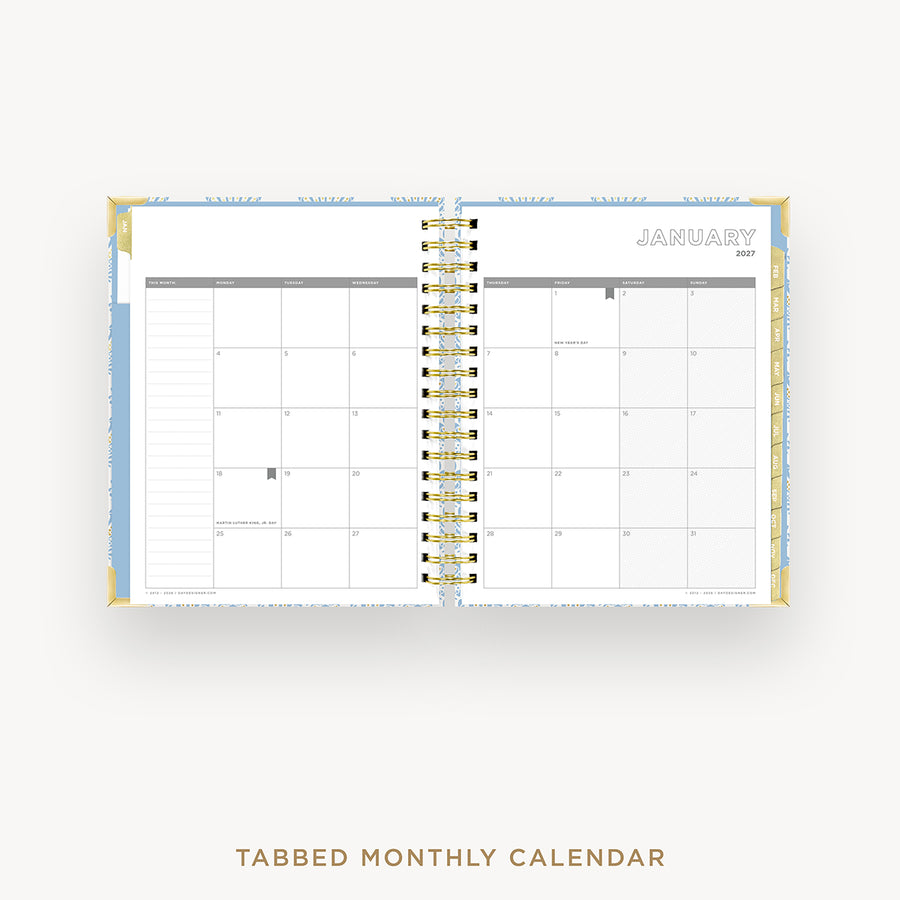 Tabbed monthly calendar open to January on a white background
