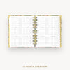 Open planner showing a 12-month overview on a white background