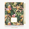 Planner with tropical floral design on a dark green background