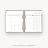 Open tabbed monthly calendar showing January on a white background