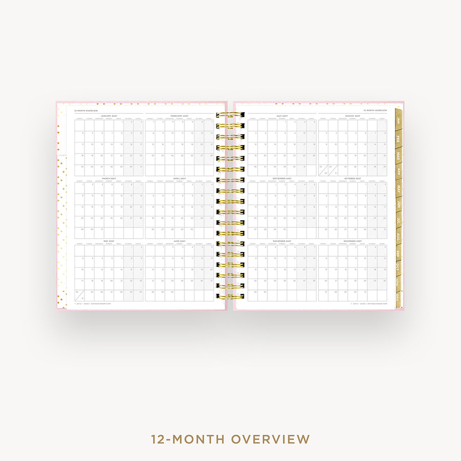 Open planner showing a 12-month overview on a white background