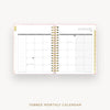 Tabbed monthly calendar open to January on a white background