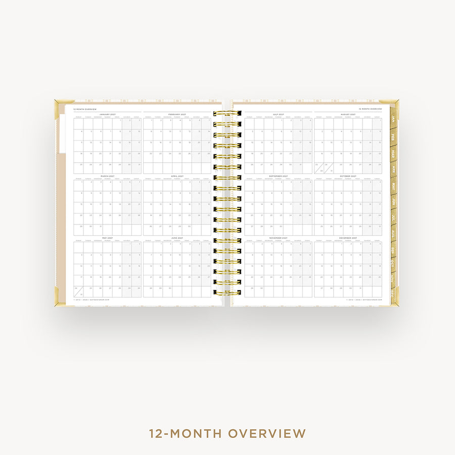 Open planner showing a 12-month overview on a white background