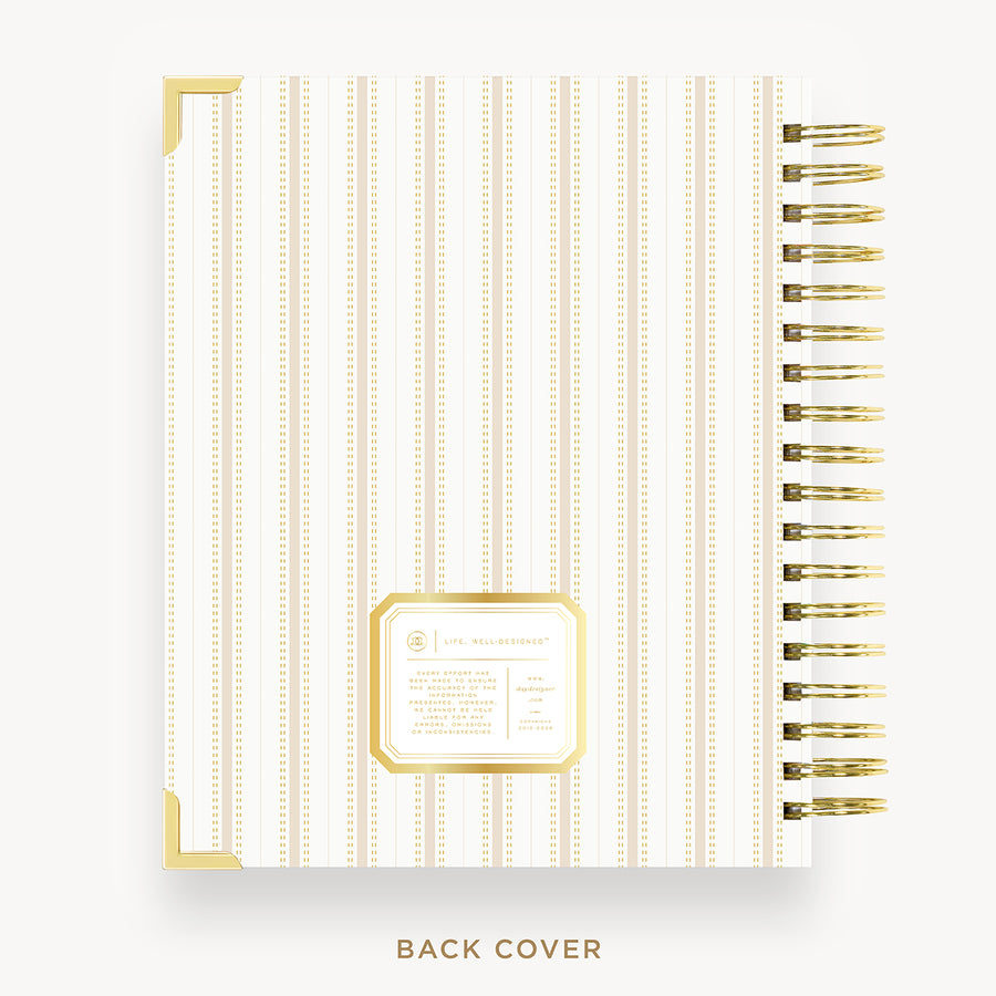 Back cover of a planner with gold accents on a white background
