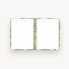 open mini notebook with lined notes pages, green liner