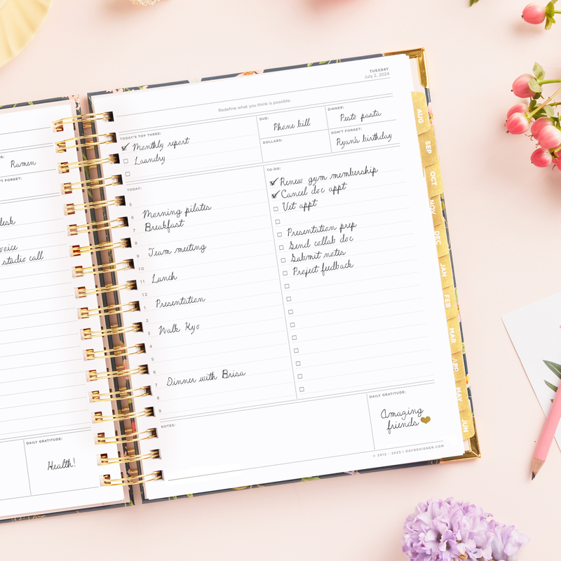 Day Designer 2024-25 daily planner: Fresh Sprigs opened with writing on it