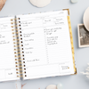 Day Designer 2025 daily planner: Azure opened with writing on it