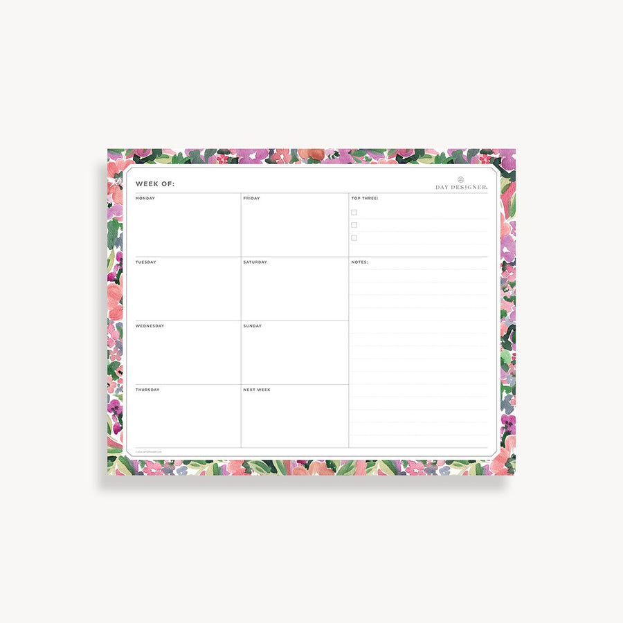 weekly planning pad with pink, purple, red, green floral border on a white background