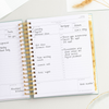 Day Designer 2025 daily planner: Sage Bookcloth opened with writing on it