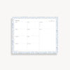 weekly planning pad with light blue and gold classic border on a white background