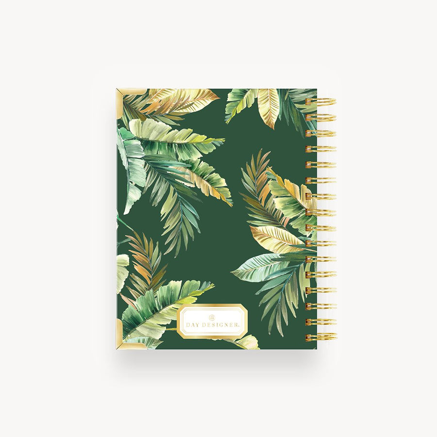 mini notebook back cover with green and gold tropical leaves on dark green background, gold binding and day designer logo