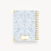 back of light blue and gold classic pattern mini notebook, gold binding, day designer logo