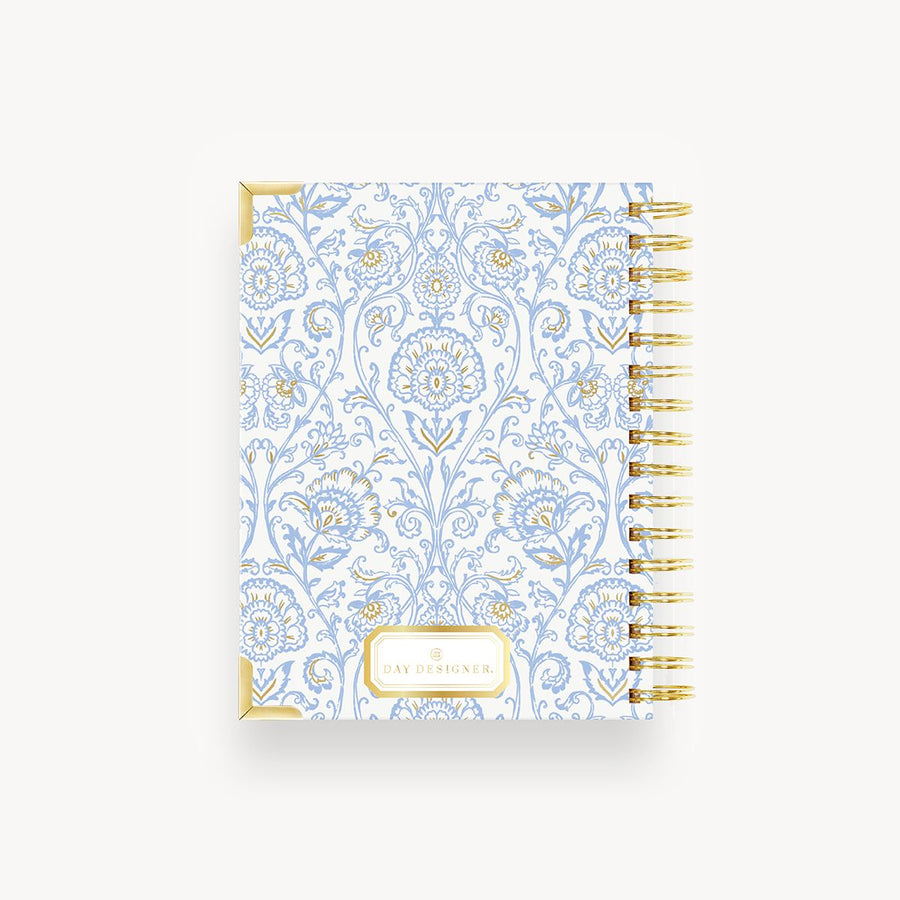 back of light blue and gold classic pattern mini notebook, gold binding, day designer logo