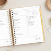 Day Designer 2026 daily planner: caramel latte pebble texture opened with writing on it