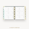 Wire-bound planner with grid layout on a white background