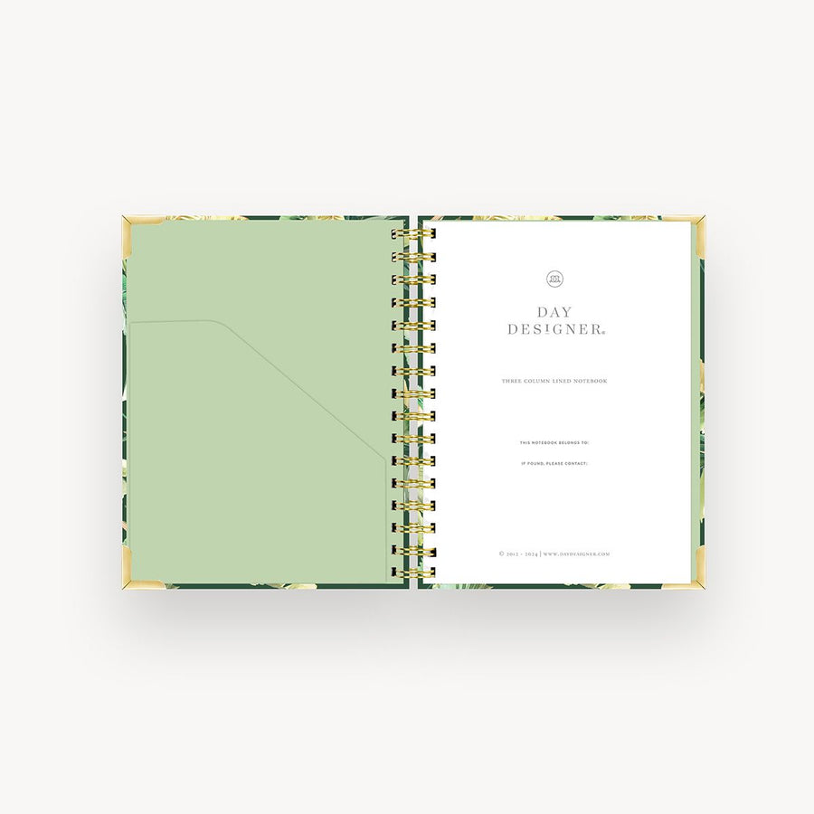 open mini notebook with green liner, gold binding, day designer title page