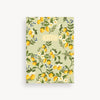 Notebook with lemon and floral design on a light green background