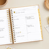 Day Designer 2026 weekly planner: caramel latte pebble texture opened with writing on it