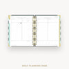 Daily planning page with a gold wire binding on a white background