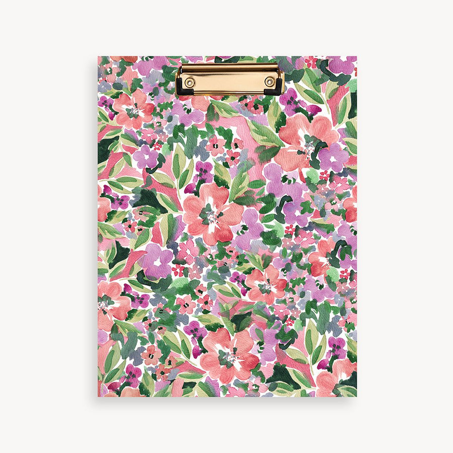 red, purple, pink, green floral pattern clipfolio with gold clip on a cream background