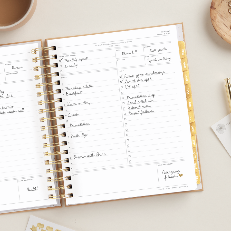 Day Designer 2025 daily planner: Caramel Latte opened with writing on it