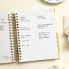 Day Designer 2023-24 Daily Planner Annabel opened with writing on it