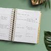 Day Designer 2023-24 Weekly Mini Planner Bali opened with writing on it