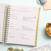 Day Designer 2023-24 Weekly Planner Casa Bella opened with writing on it