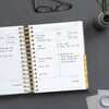 Day Designer 2023-24 Mini Daily Planner Charcoal Bookcloth opened with writing on it