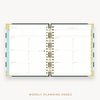 Day Designer's 2023 Weekly Planner Black Stripe with weekly planning page.