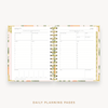 Day Designer's 2023-24 Daily Mini Planner Orange Blossom with daily planning page.