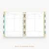 Day Designer's 2023 Daily Mini Planner Black Stripe with daily planning page.