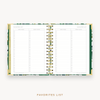Day Designer's 2023 Weekly Mini Planner Bali with movie and book tracking page.