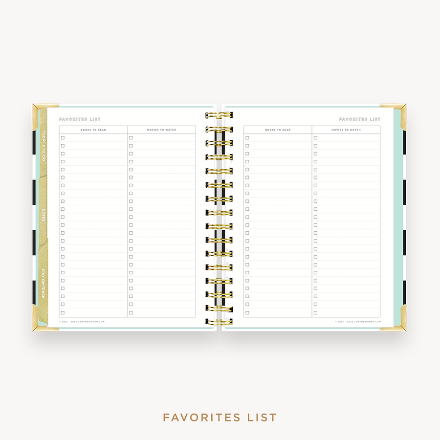 Day Designer's 2023 Weekly Mini Planner Black Stripe with movie and book tracking page.